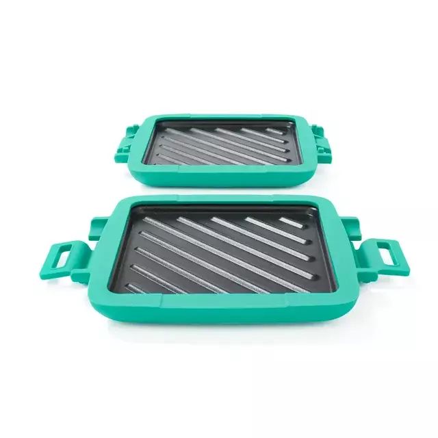 It's two metal plates inside of a green silicone housing that clip together to hold a sandwich