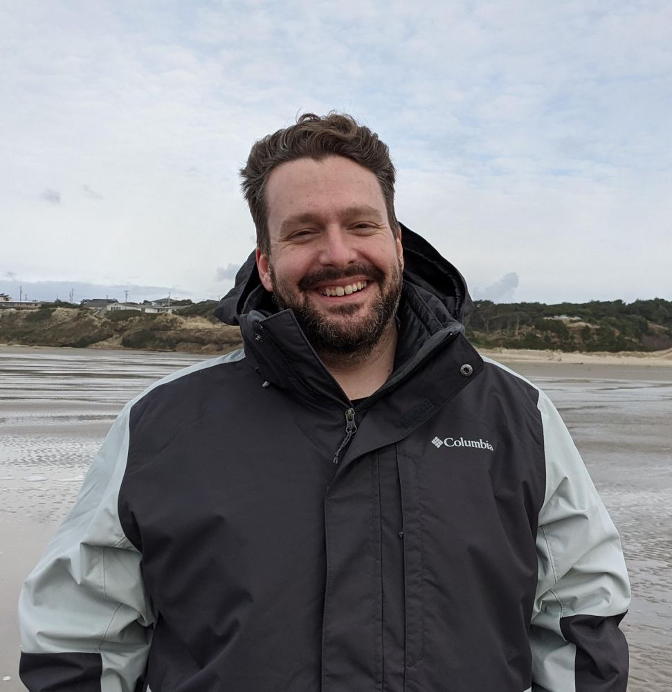 Man smiling on the beach 
