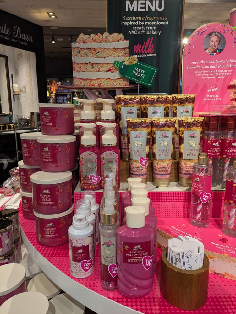 Display of pink lotions and candles 