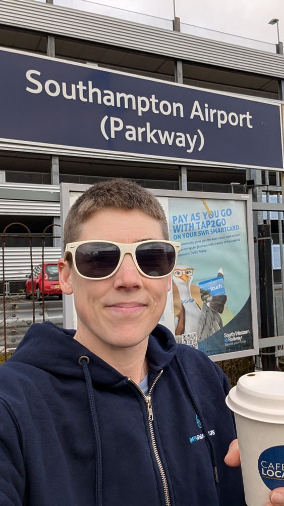 Me at the station with a coffee