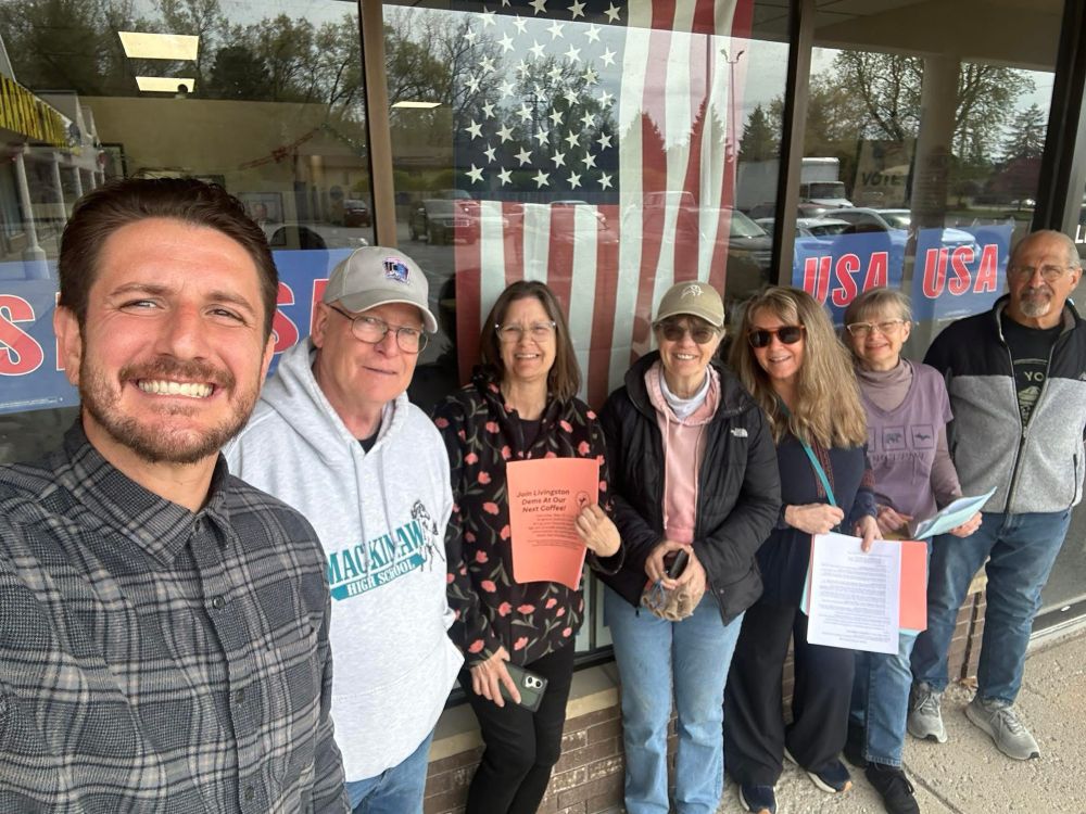 A group of people getting ready to door knock 