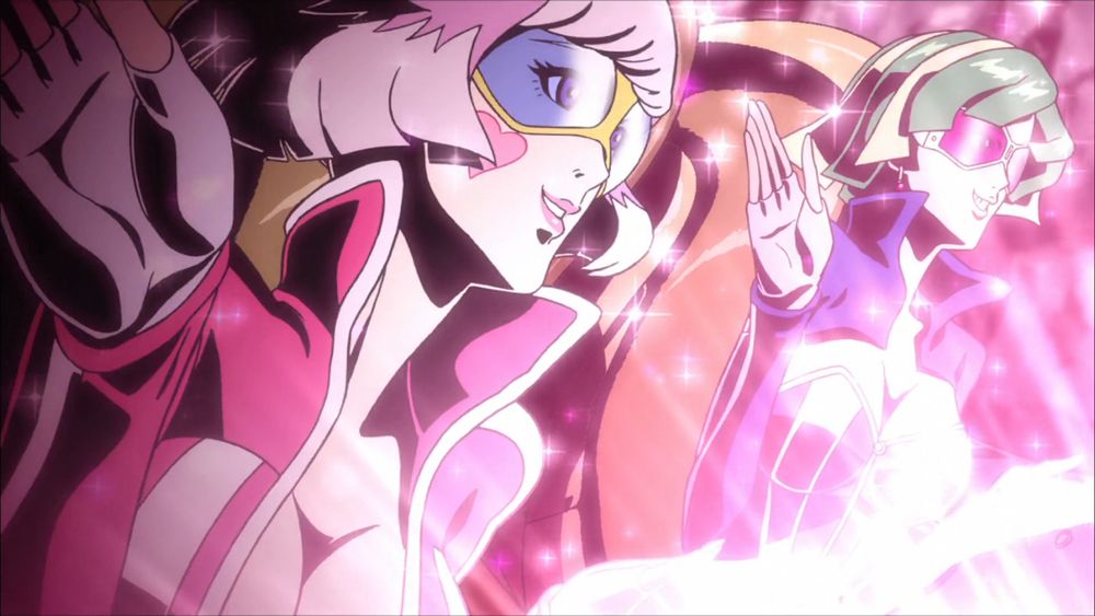 The two lady drivers waving hello.