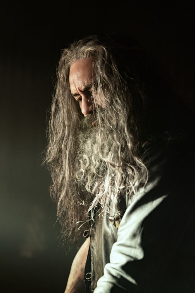 Ed in profile, with his beard and hair covering most of his face