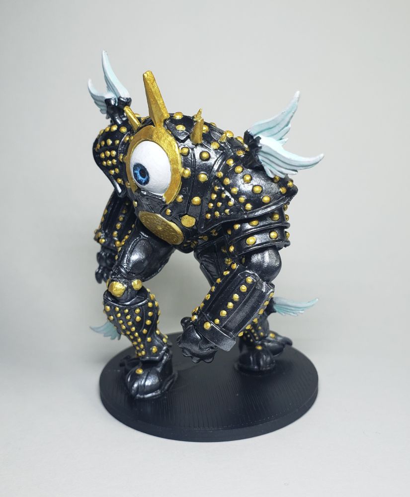 The Marut, facing towards the camera's left. It is posed as if it is walking forward menacingly, with its right foot forward as it is in stride. The left of its two mechanical hands is clenched into a fist. 