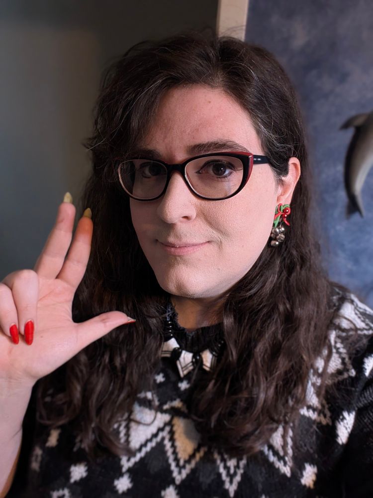 Selfie, peace sign thrown up