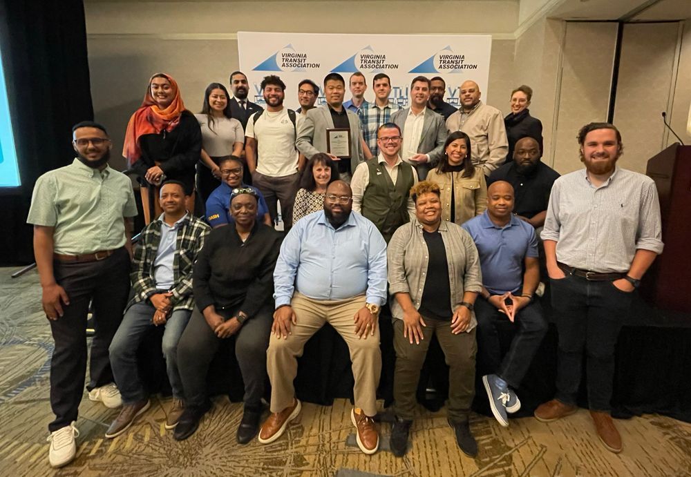 A group of DASH employees at the VTA conference, accepting an award