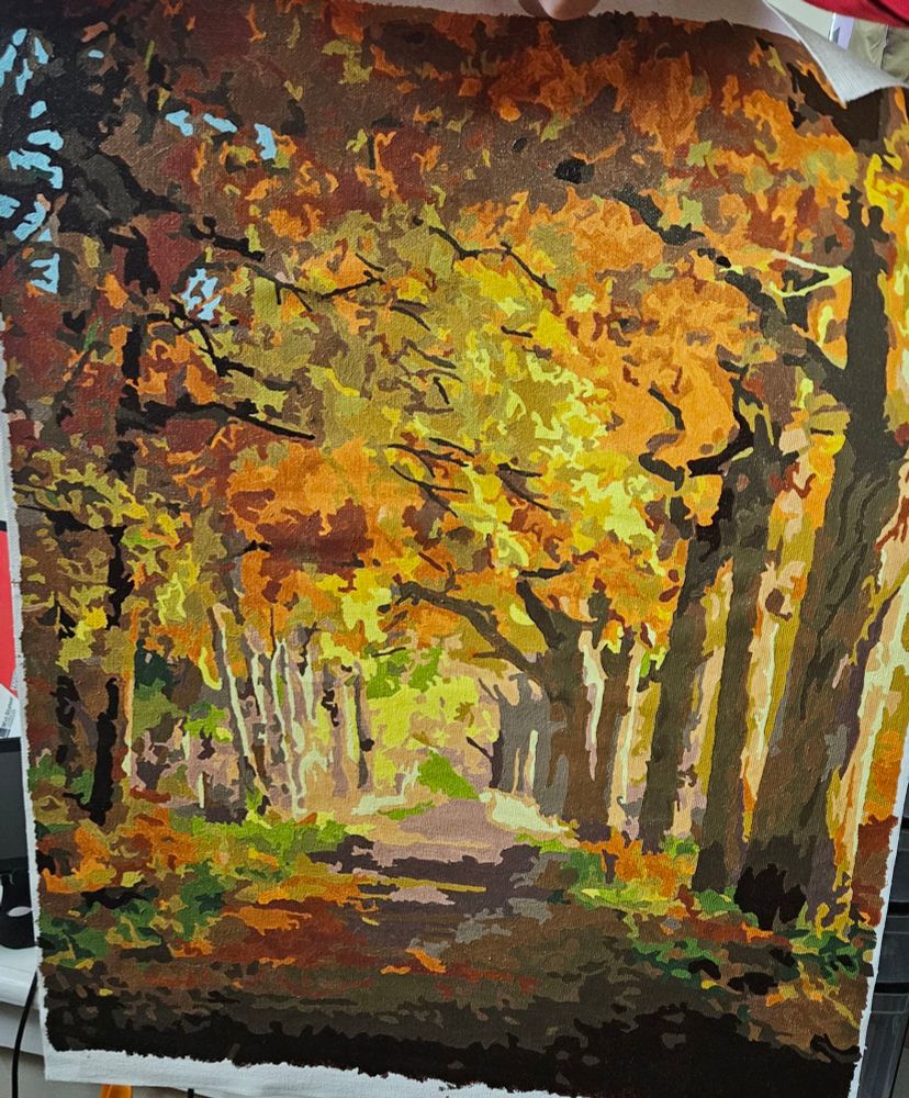 A paint-by-number of a fall colored forest