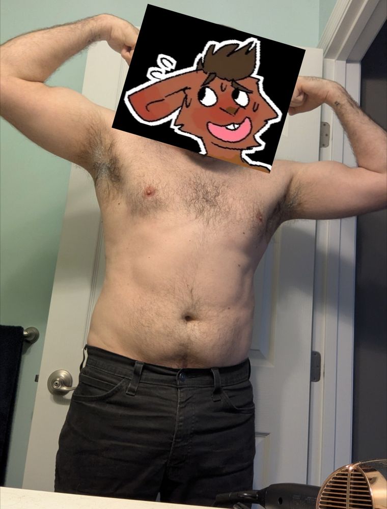 a shirtless dude in a double biceps pose. His head has been obscured by a jpeg of a rabbit head