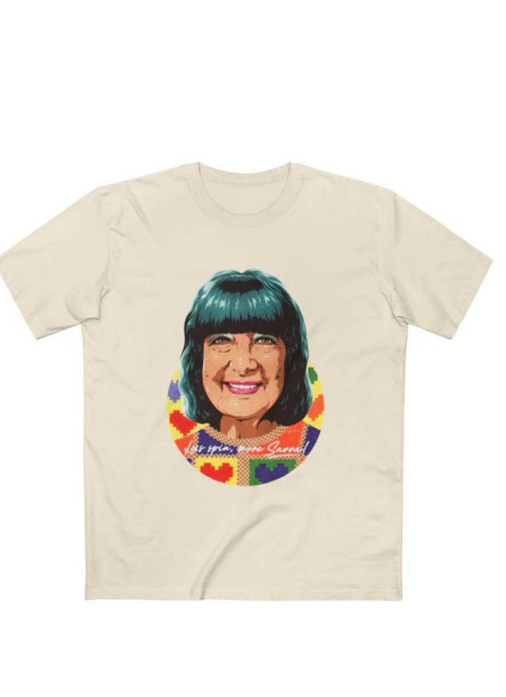 A T-shirt which has a picture of a woman looking forward and smiling