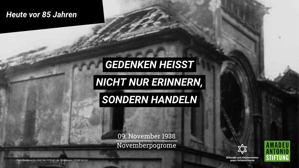 Das Bild zeigt die zerstörte Ohel-Jakob-Synagoge in der Münchner Herzog-Rudolf-Straße nach dem Brandanschlag am 9. November 1938. Das Bild wurde versehen mit der Aufschrift "Gedenken heißt nicht nur erinnern, sondern handeln."