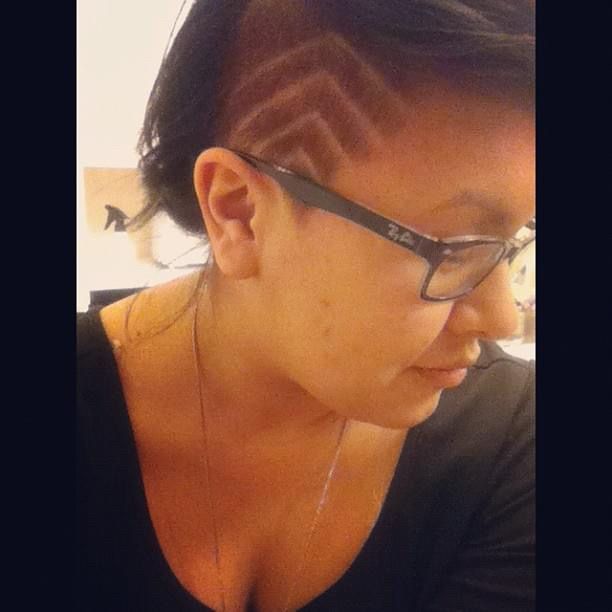 Picture of my side profile with a shaved side of my hair with a chevron pattern & ray ban glasses 