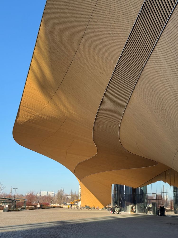 Curved wooden exterior of the library building