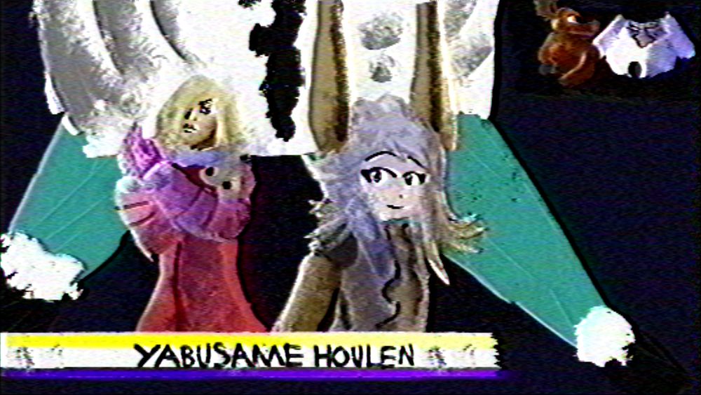 Yabusame Houlen walking into the ring accompanied by Funny Valentine whilst a reindeer Kremling and Saint Jaygarcia Saturn are doing commentary.