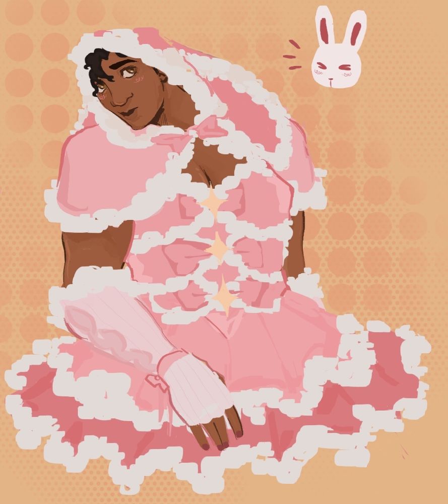 jayce in a corset dress that fans out in a tutu, the corset resembles bows and goes down his torso, with fur accents all over. he’s wearing a shawl and bunny hood that goes with his dress. 