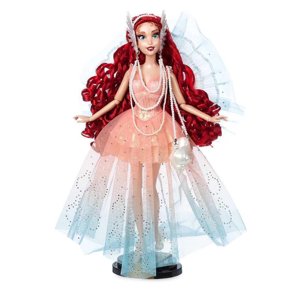 a Disney Ariel doll in a 1980s style party dress