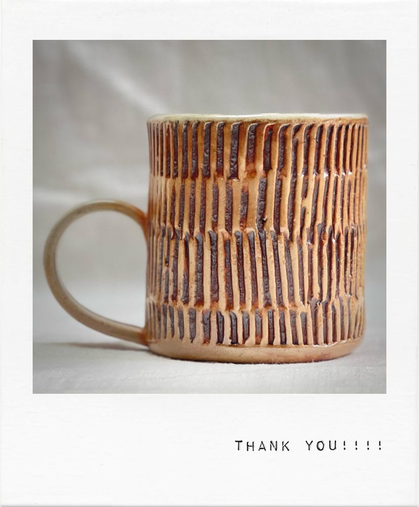 Textured woodfired mug with peachy color
