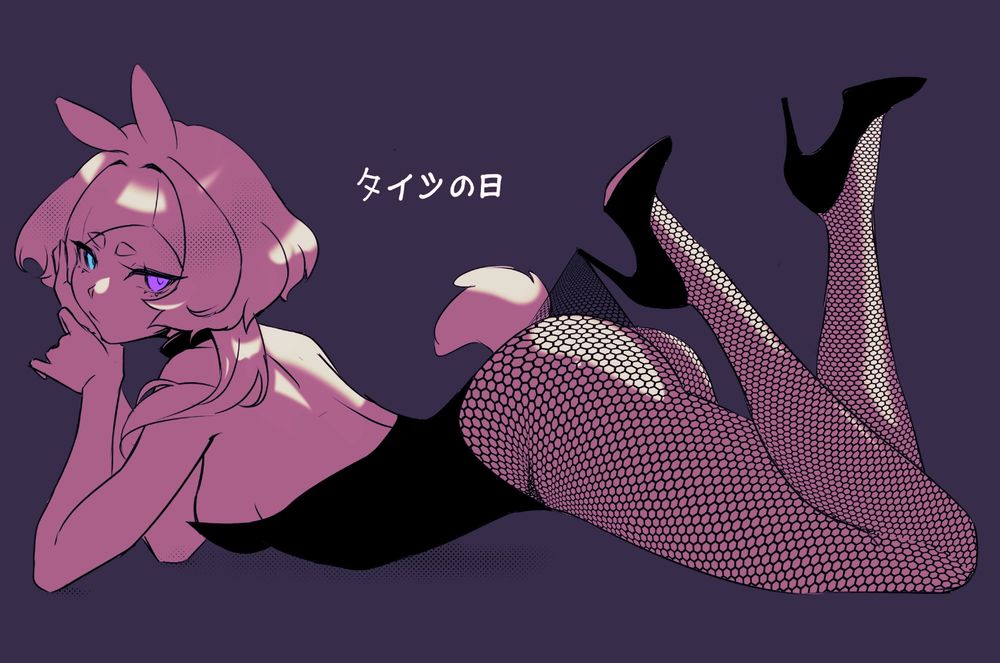 A Bunny girl laying on her tummy while posing seductively with fishnet tights