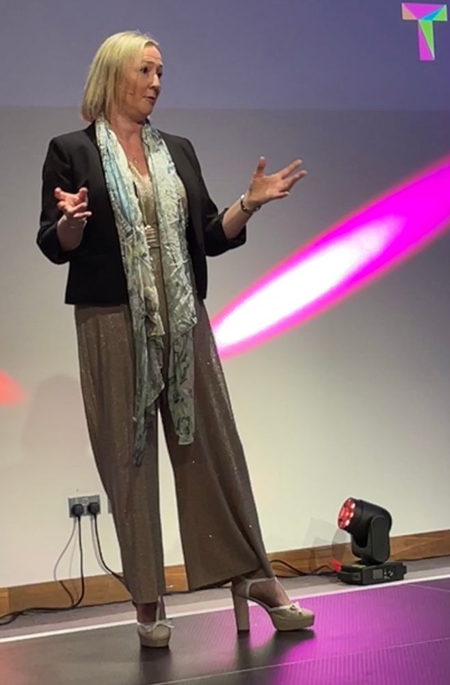 Zoe on stage at TechNExt 