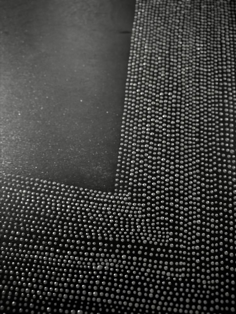 photo of the corner of a unfinished painting 