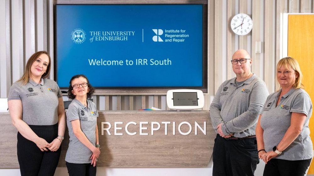 Our reception team smiling at the camera in front of IRR South Reception