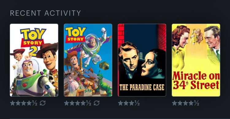 Movie posters of Toy Story 2, Toy Story, The Paradine Case, and Miracle on 34th Street