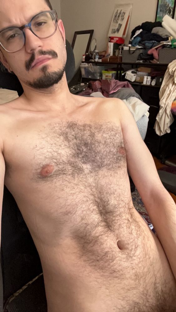 Rip showing off their naked body in their computer chair