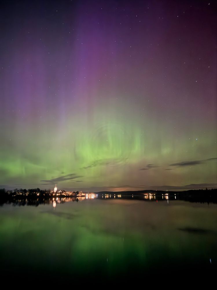 Northern lights over a lake
