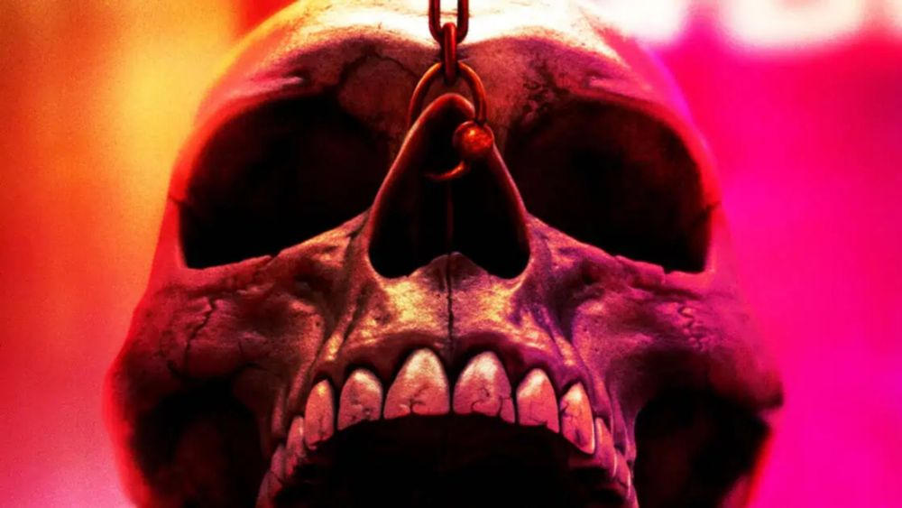 A skull from the final destination poster, on a bright pink and orange background with a nose piercing 