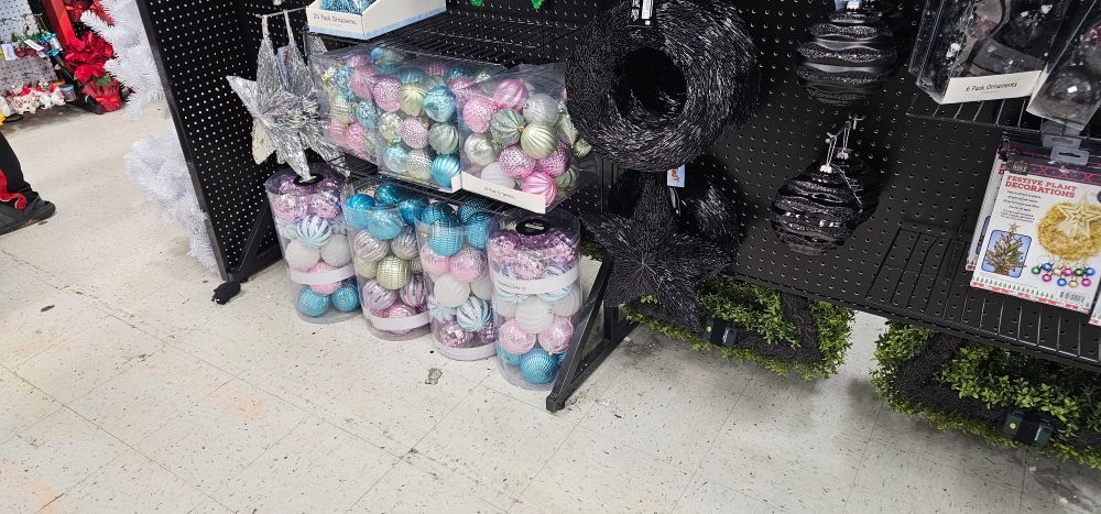 A whole shelf of trans colored Christmas decorations