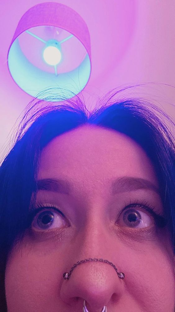a zoom in on bobas face from the nose up - she is looking off into the distance. 