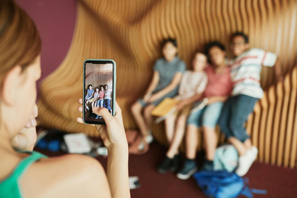 Photo by Norma Mortenson: https://www.pexels.com/photo/woman-in-white-shirt-holding-white-smartphone-8457434/