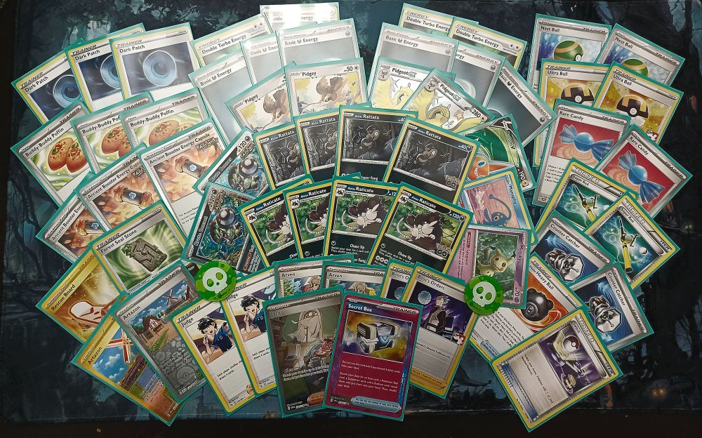 An image showing a alolan ratticate deck in a crazy layout the deck consists of

Alolan rattata x4
Alolan ratticate x4
Brute bonnet x2
Pidgey x2
Pidgeot ex x2
Rotom V x1
Manaphy x1
Mimikyu x1
Judge x2
Arven x2
Boss's orders x2
Jacq x1
Nest ball x2
Ultraball x2
Rare candy x2
Super rod x2
Counter catcher x2
Hisuian heavy ball x1
Switch x1
Dark patch x3
Buddy-buddy poffin x3
Ancient booster energy capsule x3
Rescue board x1
Forest seal stone x2
Artazon x2
Secret box x1