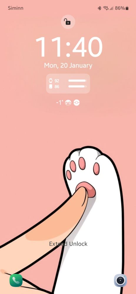 My lockscreen. Background is pastel pink. A cartoon of a cat paw showing toe beans being touched by a human finger.