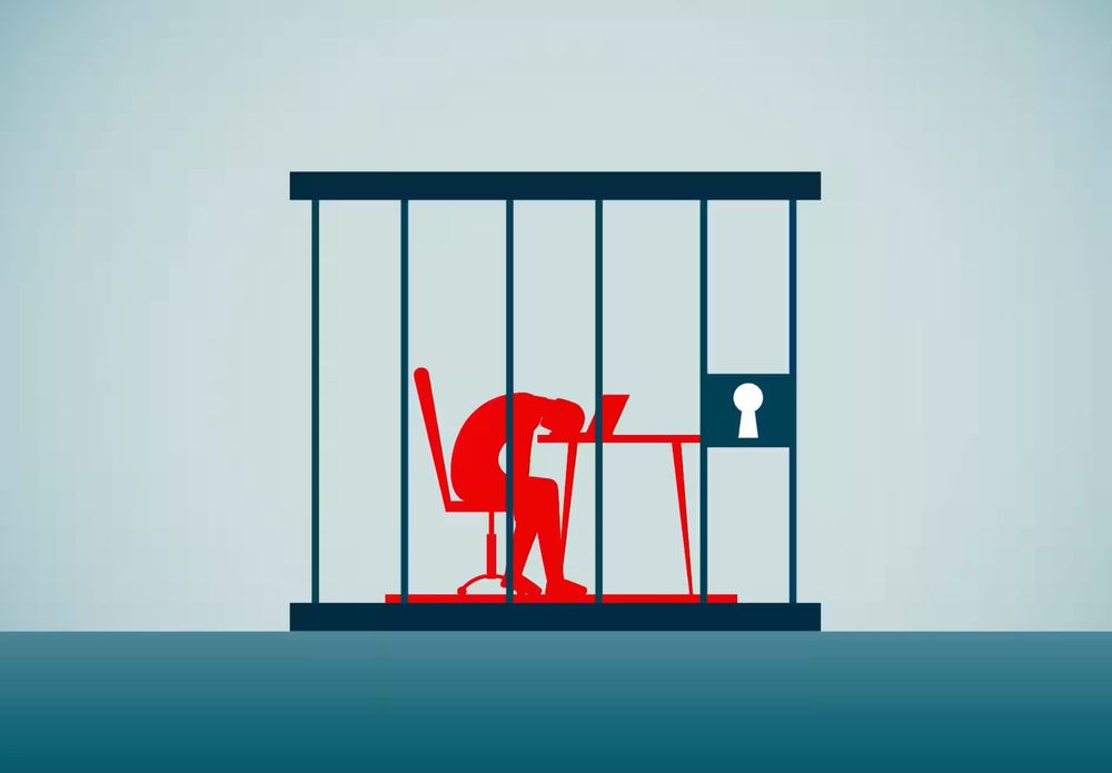 Desenho de um homem reclinado sobre o notebook em uma mesa dentro de uma prisão
Ilustração: MarketWatch illustration/iStockphoto