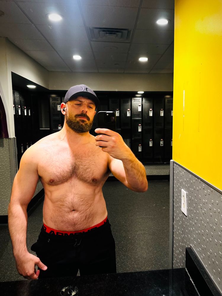Selfie in locker room with horror film lighting 