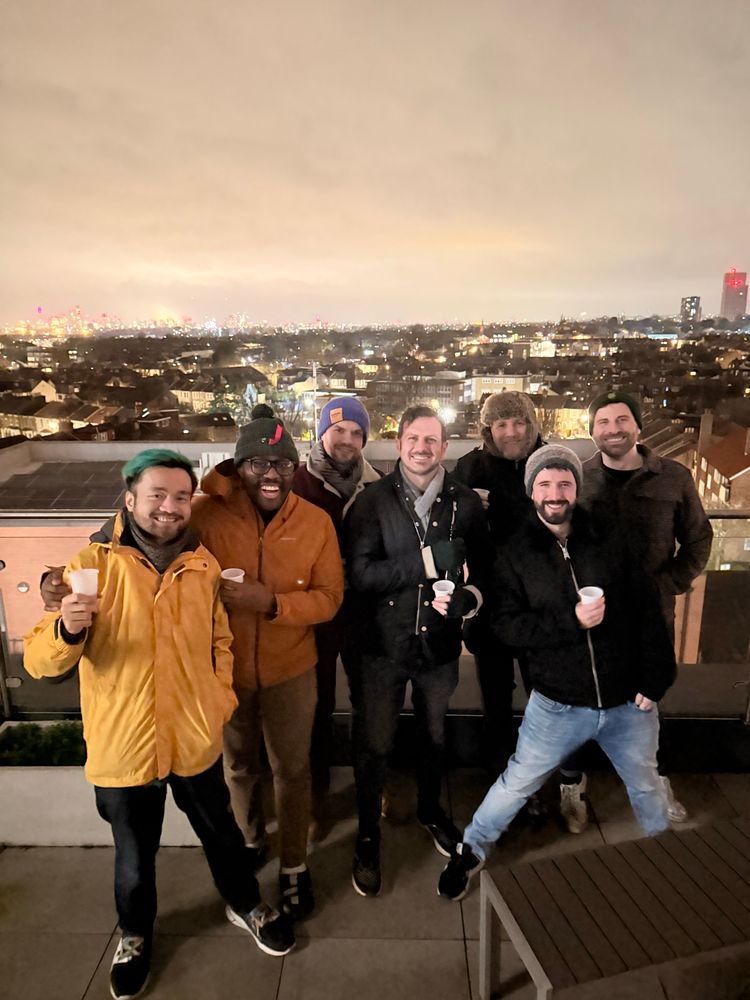 The seven of us on the roof with London in the background 