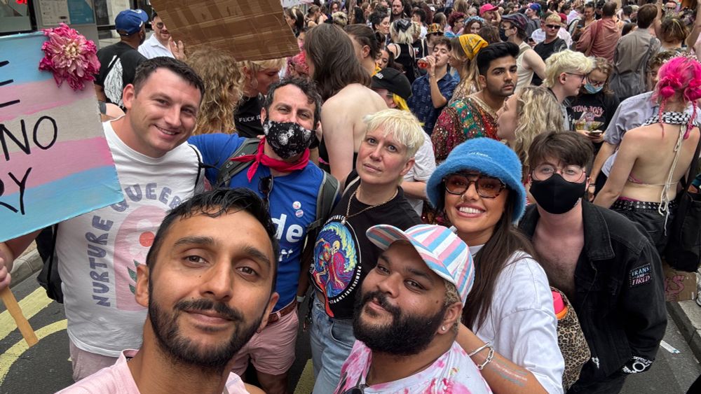A picture of the seven of us marching in a crowd 