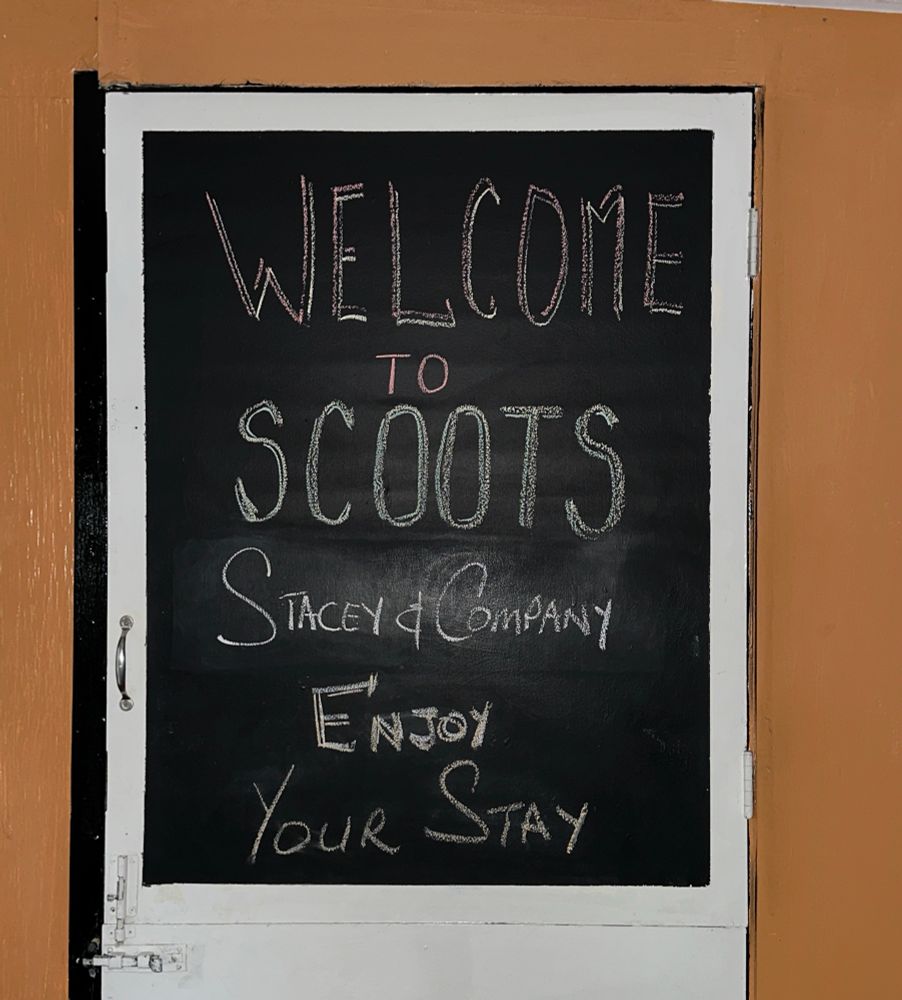 A welcome sign reading: Welcome to SCOOTS
Stacey and Company
Enjoy Your Stay