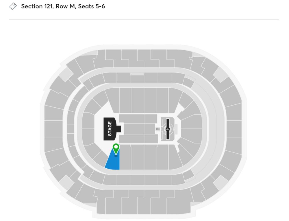 A seating chart of the American Airlines Center (AAC) in Dallas, TX, with one section highlighted in blue, and a green pin marker. At the top of hte image is the label 'Section 121, Row M, Seats 5-6'.