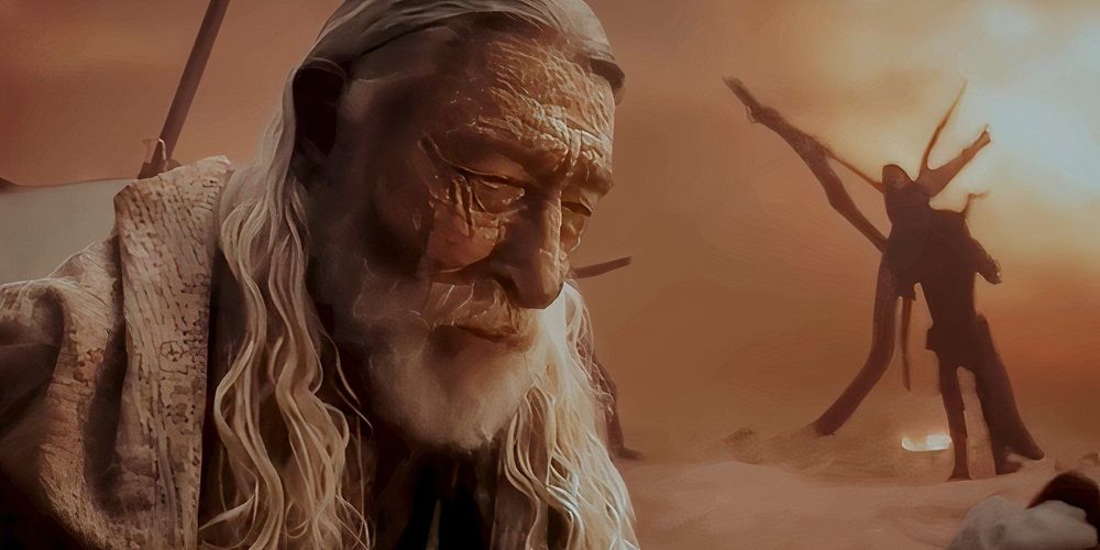 A scene from Furiosa: A Mad Max Saga, an elderly man with long white hair, white beard, and badly-weathered, sun-damaged face, in robes with tiny writing on them... The History Man squints and looks down as a woman is strung up on a tree behind him in the distance.