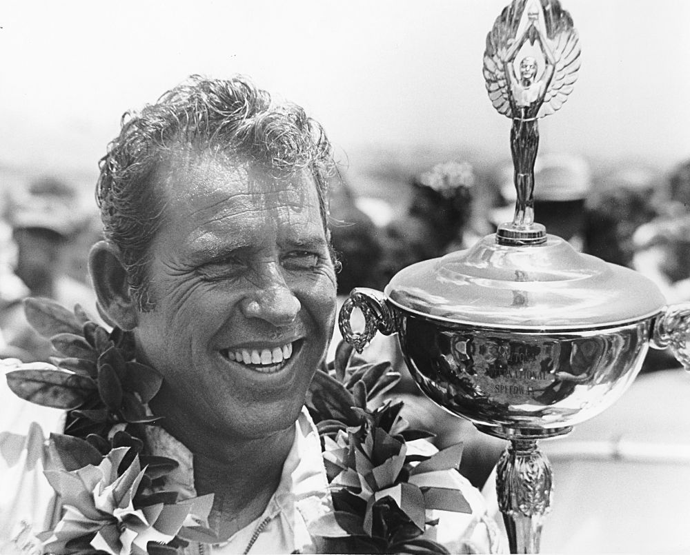 David Pearson holding a trophy