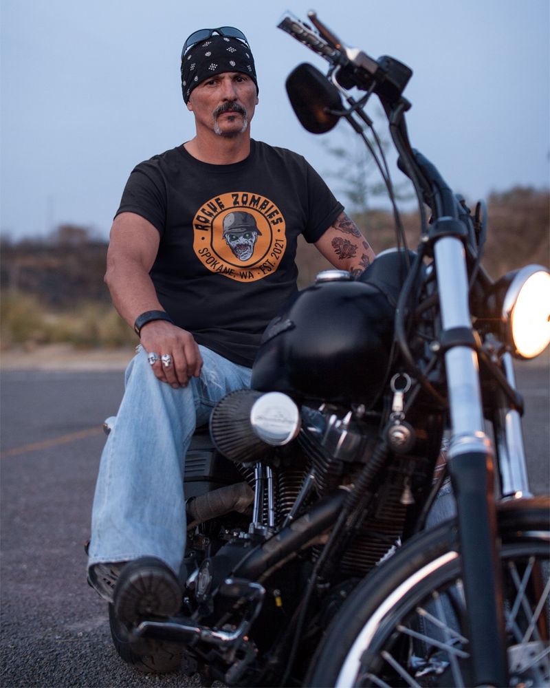 A circular badge logo with a ROGUE zombie head in the center for a motorcycle club