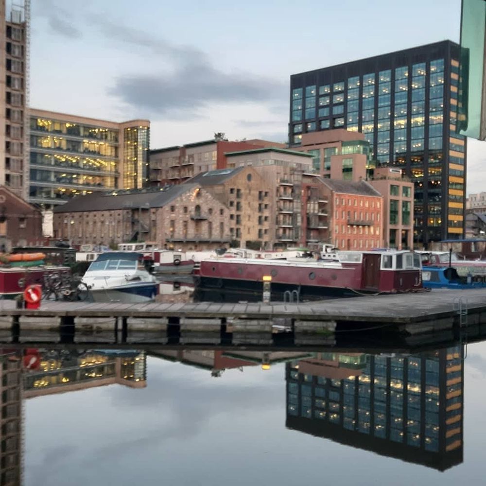 Around grand canal dock in Dublin and the reflection is in the water 