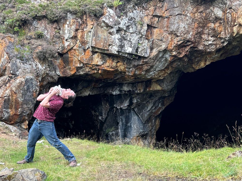 I am losing a fight with a small white rabbit (prop), like Sir Bors in the film. I'm in front of the abandoned mine entrance used as the Cave of Caer Bannog, which looks greener and less bone-strewn now. 