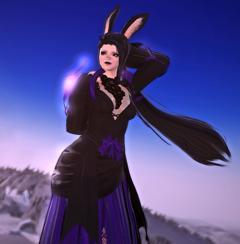 The Burn (dungeon) as background.
Lucy is standing against the wind and looking away. Her hair is being dragged by the wind current. Her left arm is over and behind her head while her right hand goes to her chest. She is wearing a long and black with purple dress.