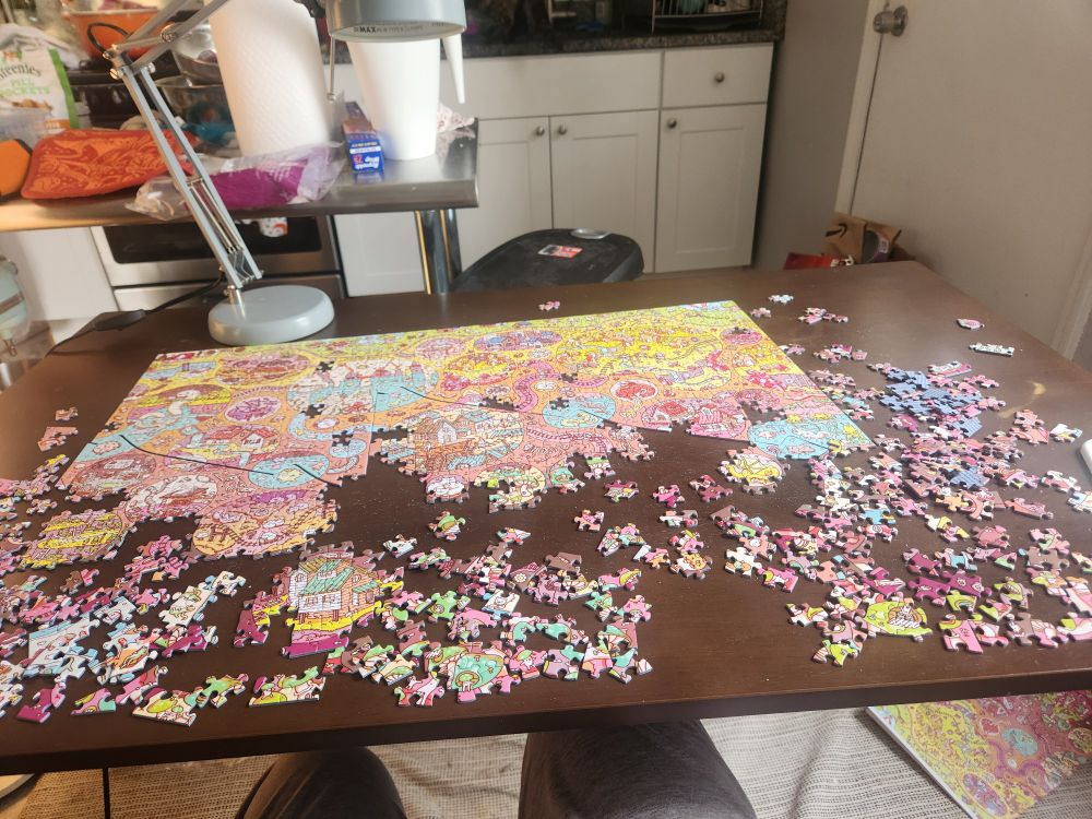 a colorful half finished puzzle