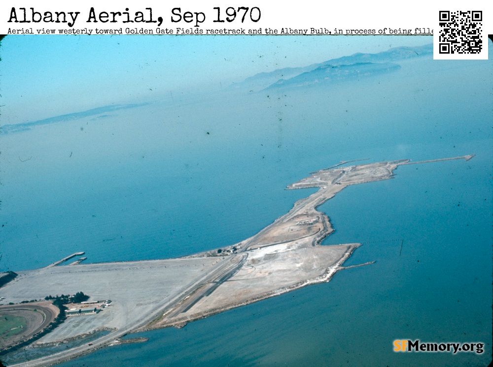 Aerial view west toward the Golden Gate Fields Parking lot and the landfill north of it, the Albany Bulb . pretty much everything shown is landfill