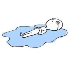 Cartoon drawing of a figuring lying on the ground, surrounded by a pool of blue tears.