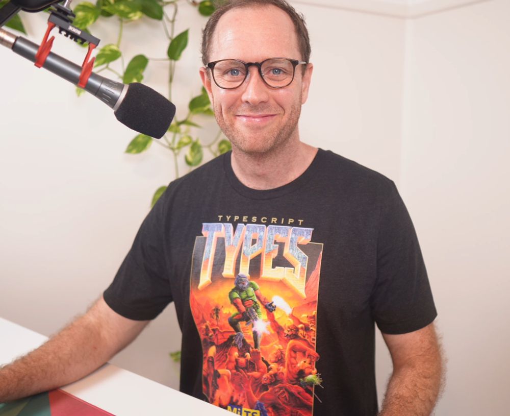 Picture of me wearing a "typescript types" doom inspired t-shirt