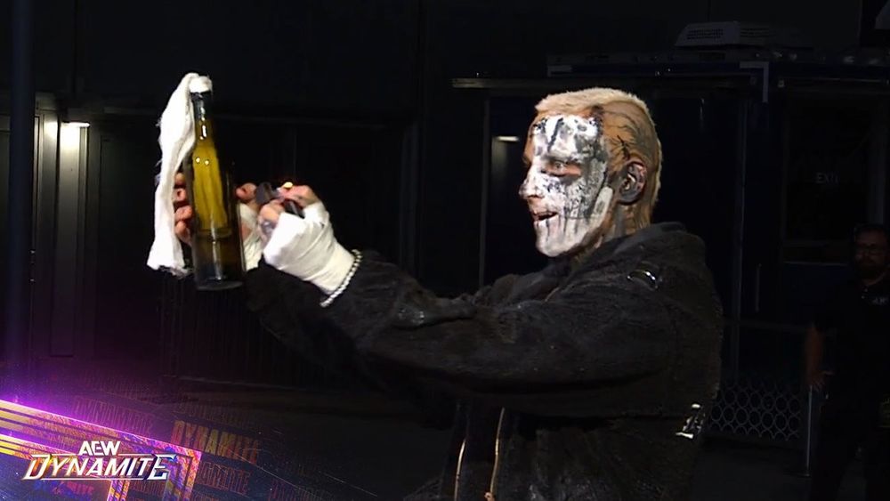 AEW's Darby Allen getting ready to light a Molotov cocktail 